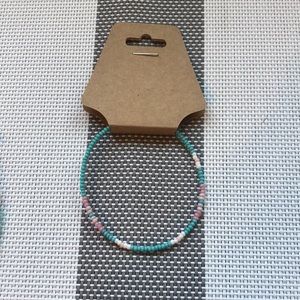 Pink white and teal bracelet